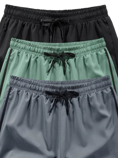 3pcs Men's Breathable Running Shorts with Reflective Print - Lightweight, Stretchy Gym & Outdoor Training Shorts with Pockets (Gray, Black, Dark Green)